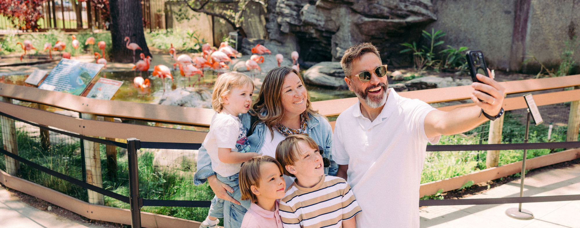 A family takes a selfie at the Central Coast Zoo