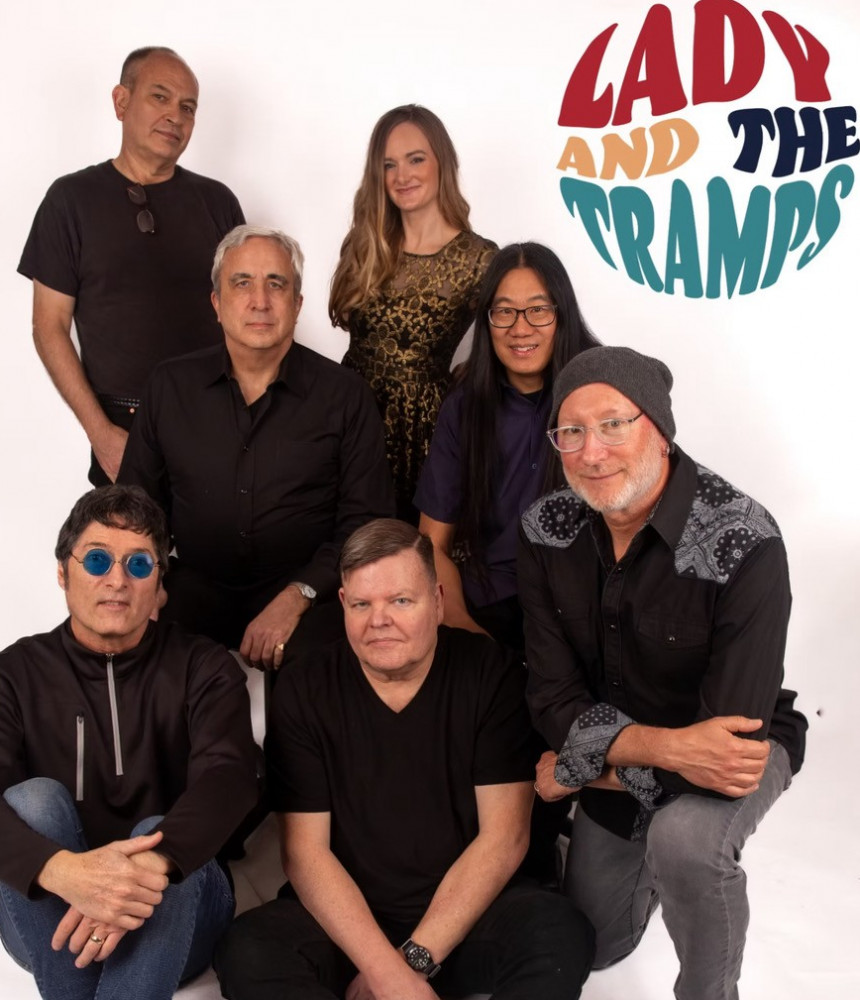 Seven Lady and the Tramps band members pose in a poster, with the band logo in the corner.