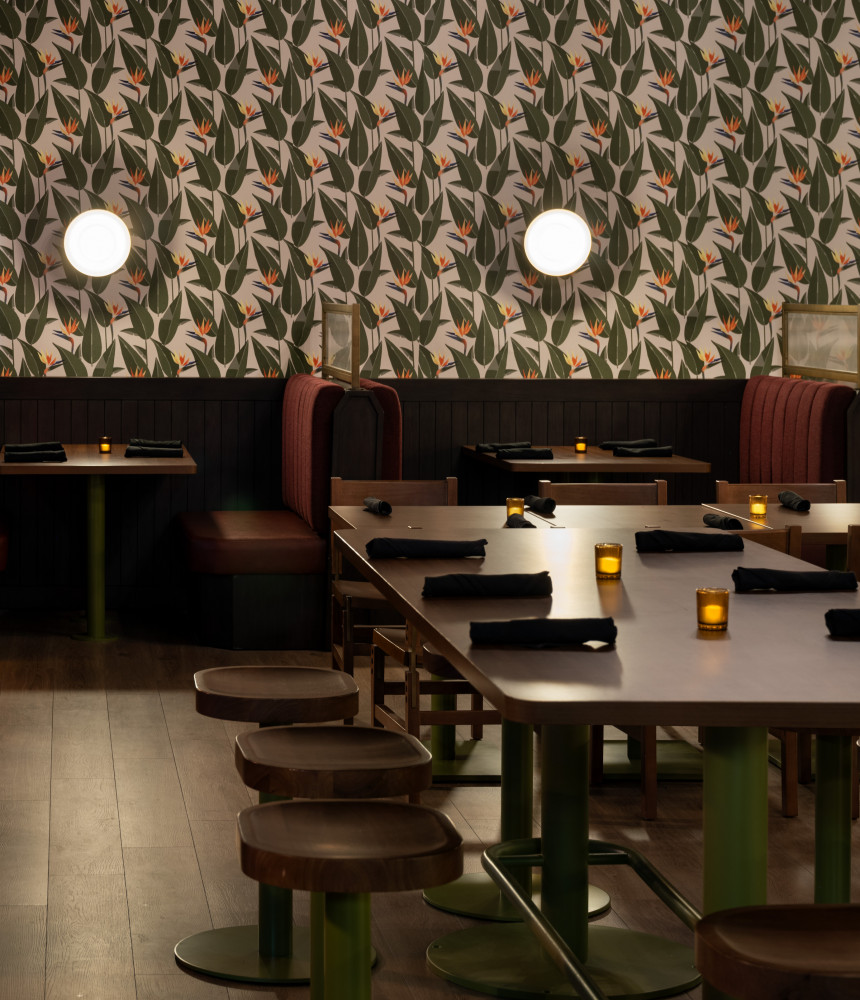 Dining tables and booths inside of Mabel Lounge in Atascadero, CA. 